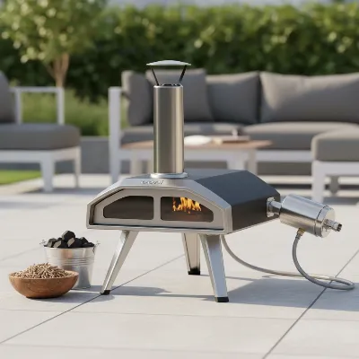 Ooni Karu 16 multi-fuel pizza oven with wood, charcoal, and gas burner options laid out, showcasing its versatile design.