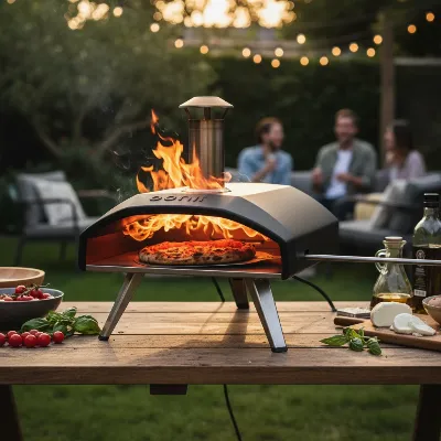 Ooni Fyra 12 cooking a pizza with visible flames in a backyard setting